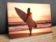 Silhouette of beautiful surfer