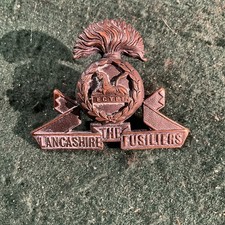 The Lancashire Fusiliers Officer's Service Dress Cap badge BLADES BRONZE. AC55