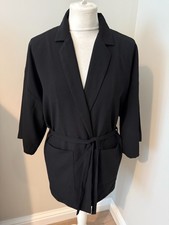 Womens black jacket with waist tie fastening by Topshop, fits size 6-8 good cond
