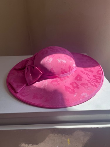 Fuchsia colored hat - as, a