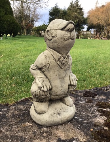 Stone garden cricket player - stone,