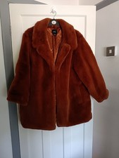 Capsule faux fur rust coloured