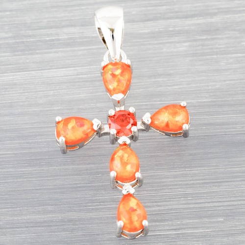 Cross simulated orange garnet - simulated,