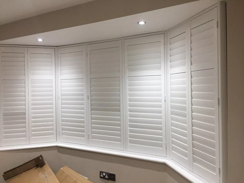 Curved wooden bay window