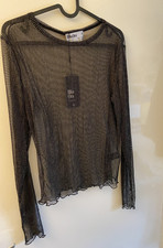 Rita Ora long sleeved black