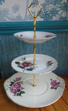 3 tier  cake stand  Mismatched vintage floral plates with pink roses