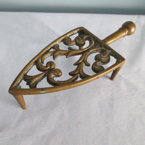 Antique flat iron stand cast - antique,
