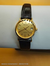Ladies vintage Bulova watch gold tone with leather strap