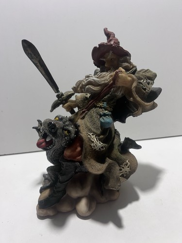 Wizzard riding dragon - on,