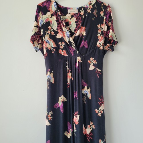 Per una butterfly and floral - una,