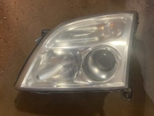 LEFT DRIVERS SIDE HEADLIGHT