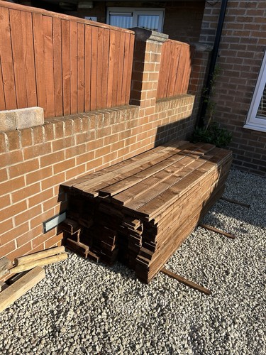 Brown treated timber fence - timber,