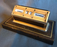 Vintage Gilt Metal Rolling Day