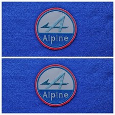 A Pair Of Motor Car Racing