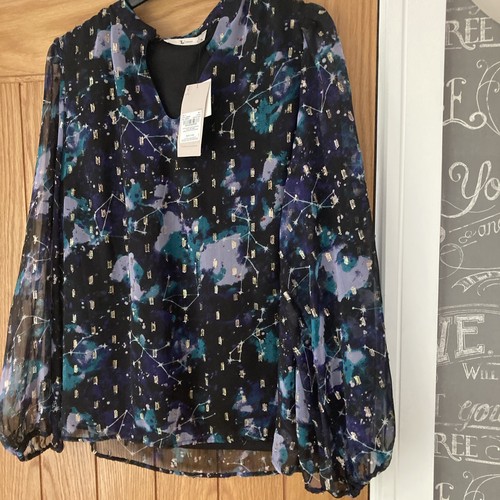 Ladies size shirt - 14, new