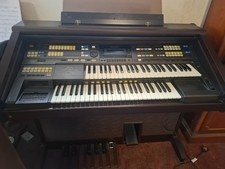 TECHNIKS GA1 ORGAN stool and box of music books