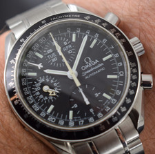 omega speedmaster triple date