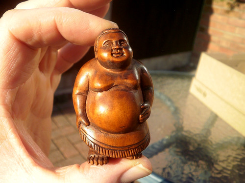 Hand carved netsuke - hand, sumo