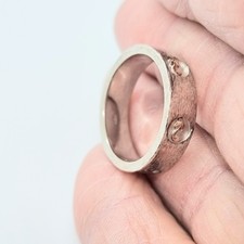 Clogau sterling silver Insignia ring with leaf glyphs eternity style ring.