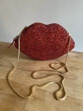 Lulu Guinness red glitter