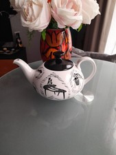 RARE METRO SHAPED TEAPOT