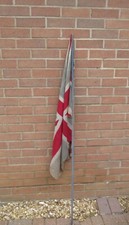 Vintage large faded British Union Jack flag on stick / pole