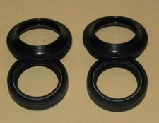 Fork seals with dust caps for