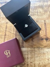 PLATINUM 0.60CT DIAMOND PEAR SHAPED RING WITH HALO (SIZE H)