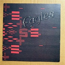 EAGLES 1976 TOUR PROGRAMME SQUARE BOOKLET WITH PICTURES AND LYRICS (the centre p