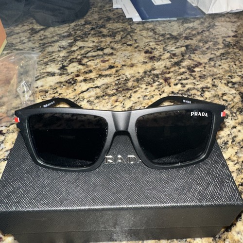 Prada luxottica sunglasses - luxottica,