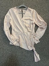Coast woman’s pale pink