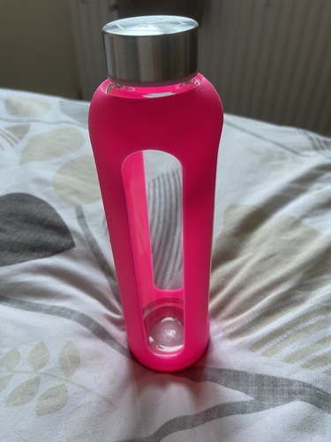 Pink glass water bottle - water,