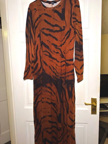 Next brown black animal - brown/black,