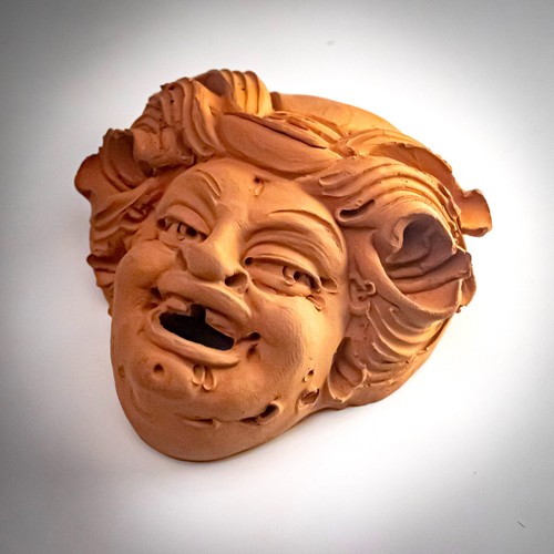 Terracotta wall plaque komos - terracotta,