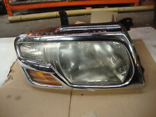 2005 MITSUBISHI PAJERO SWB DRIVERS OFF SIDE HEADLIGHT - SLIGHT DAMAGE - SEE PICS
