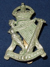 THE ROYAL IRISH RIFLES REGIMENT BRITISH MILITARY CAP BADGE W/M  - K/C - SLIDER