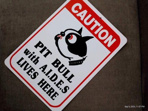 Caution pit bull sign - caution,