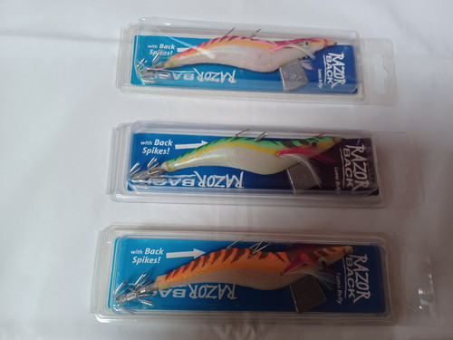Three razorback squid - three, lures
