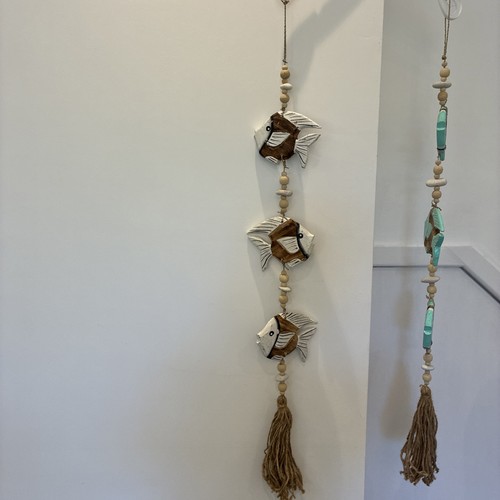 Wooden carved fish - with, sea