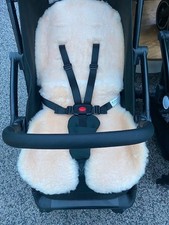Sheepskin like stroller seat liner