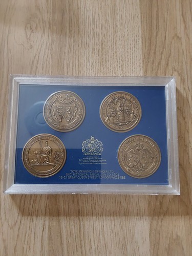 Four bronze medallions of - medallions,
