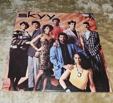 NM/EX. SKYY From the Left