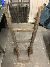 Antique oak sack trolley with Solid metal wheels with rubber trim 