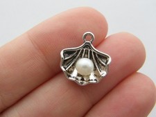 6 Pearl in oyster shell charms