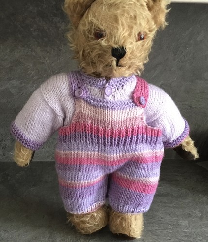 Hand knitted teddy bear - hand,
