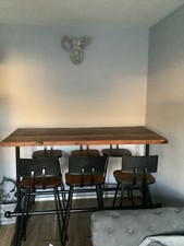 bar height dining table and 6 chairs