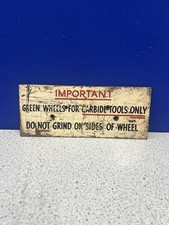 Vintage metal grinding information sign