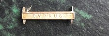 REPLACEMENT CYPRUS  CLASP FOR FULL SIZE GENERAL SERVICE MEDAL . (D)