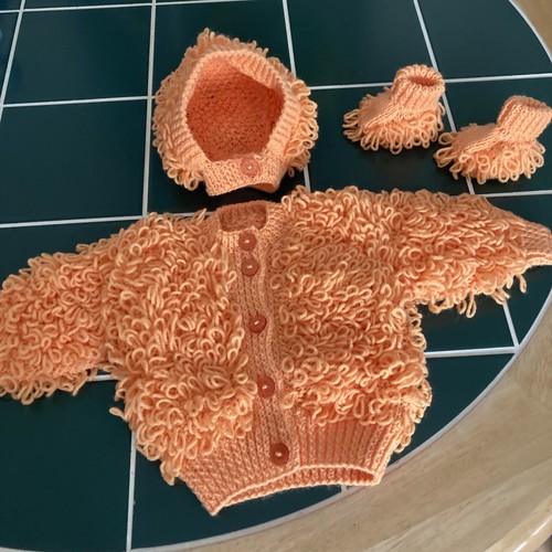 Hand knitted baby - hand, (tangerine)
