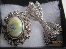 vintage Staybrite brooches one porcelain pins in box